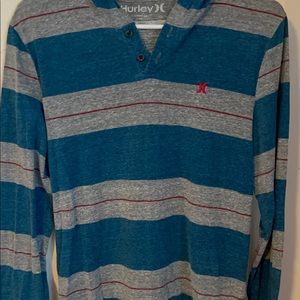 Hurley long sleeve shirt with a hoodie. Size small